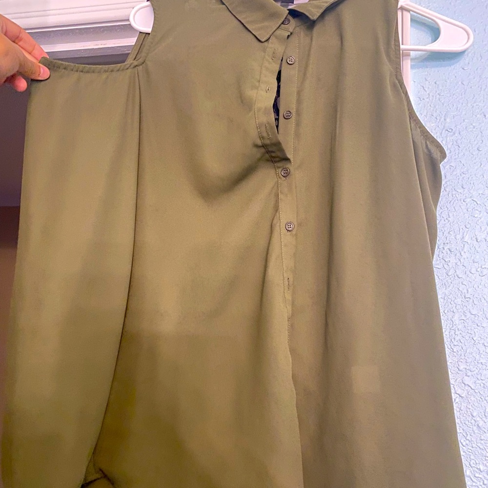 I’m selling a green shirt it’s cute from the back